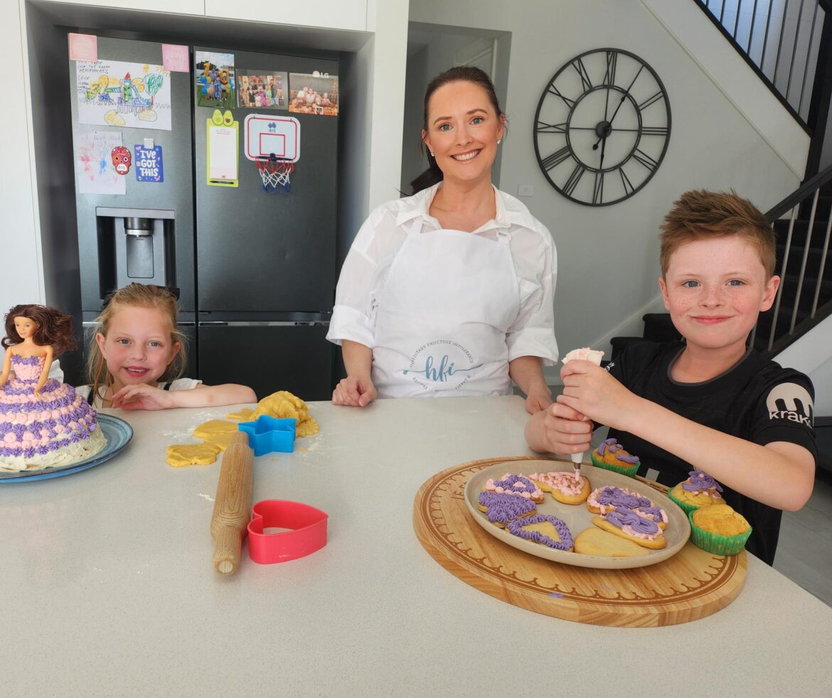 Family in kitchen raising awareness for Hereditary Fructose Intolerance.